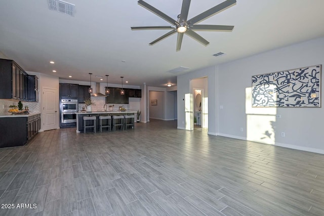 living room featuring ceiling fan