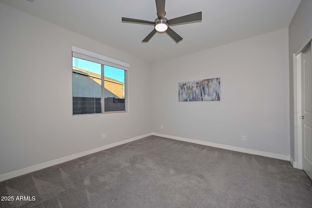 unfurnished bedroom featuring carpet floors and ceiling fan