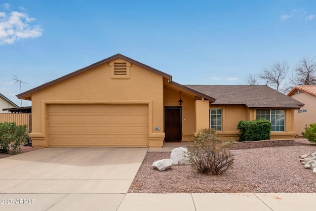 single story home featuring a garage, driveway, a shingled roof, and stucco siding