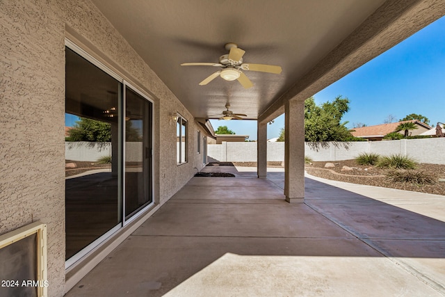 view of patio featuring ceiling fan