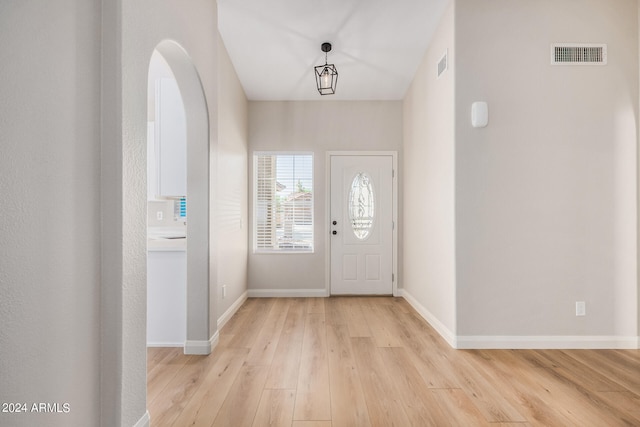 entrance foyer with light hardwood / wood-style flooring