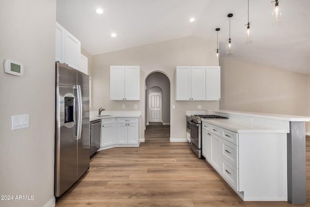 kitchen with pendant lighting, sink, light hardwood / wood-style flooring, white cabinetry, and appliances with stainless steel finishes