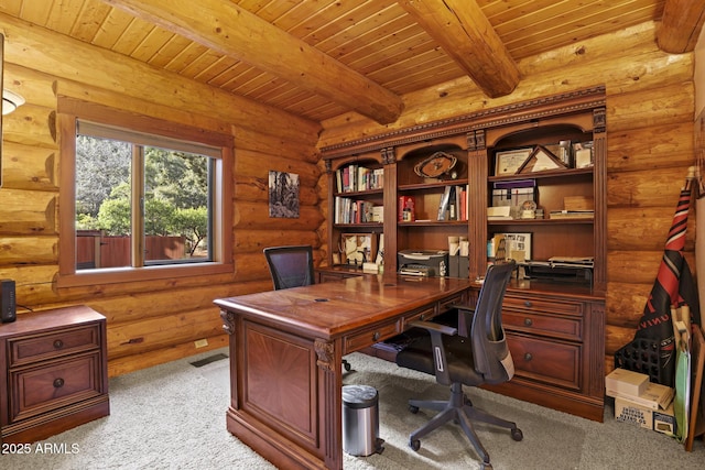 carpeted office with beamed ceiling, rustic walls, and wood ceiling