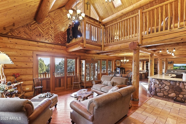 living room featuring french doors, wood ceiling, a chandelier, high vaulted ceiling, and beamed ceiling