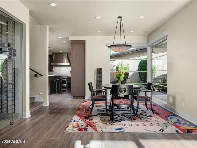 dining space with dark wood-type flooring