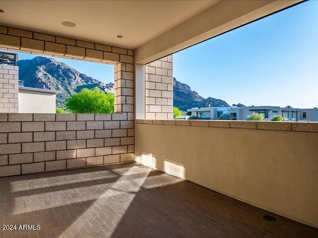 view of terrace featuring a mountain view