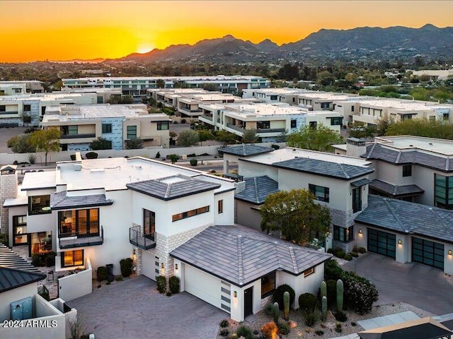 aerial view at dusk with a mountain view