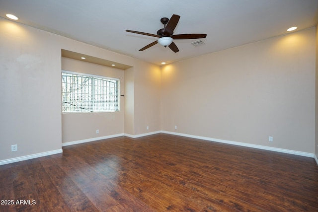 1301 N Santa Rosa Ave, Tucson, AZ 85712 - empty room with visible vents, baseboards, a ceiling fan, and dark wood-style floors