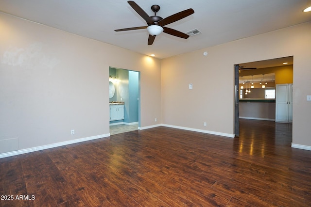 1301 N Santa Rosa Ave, Tucson, AZ 85712 - unfurnished room featuring wood finished floors, ceiling fan, baseboards, and visible vents