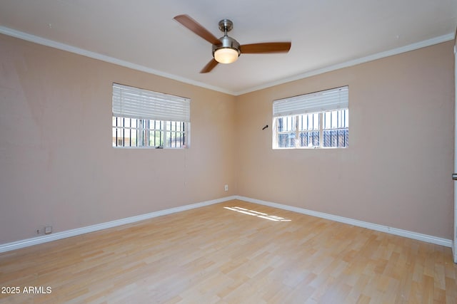 1301 N Santa Rosa Ave, Tucson, AZ 85712 - unfurnished room featuring baseboards, wood finished floors, crown molding, and ceiling fan