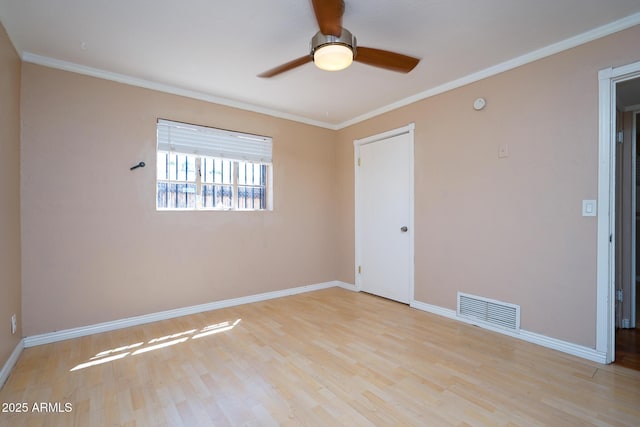 1301 N Santa Rosa Ave, Tucson, AZ 85712 - unfurnished room with wood finished floors, ceiling fan, baseboards, and visible vents