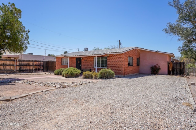 1301 N Santa Rosa Ave, Tucson, AZ 85712 - exterior space with brick siding and fence