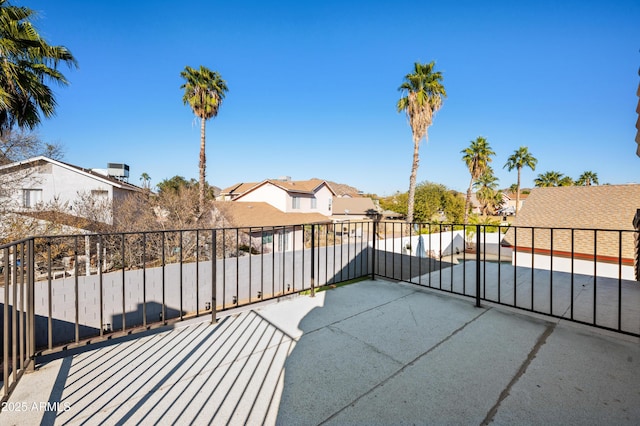 view of patio featuring a balcony