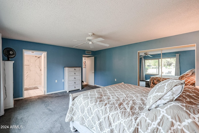 carpeted bedroom featuring a textured ceiling, ceiling fan, and connected bathroom