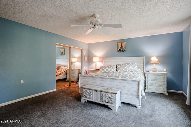 carpeted bedroom with ceiling fan, a textured ceiling, and a closet