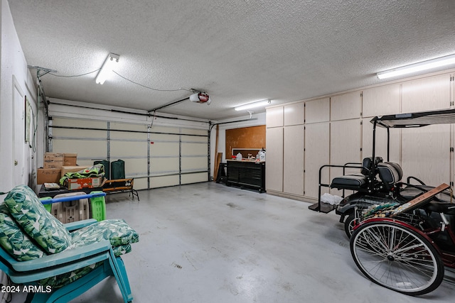 garage featuring a garage door opener