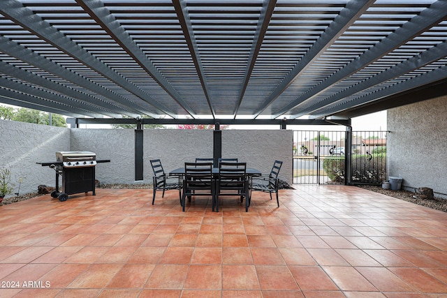 view of patio featuring a pergola and area for grilling