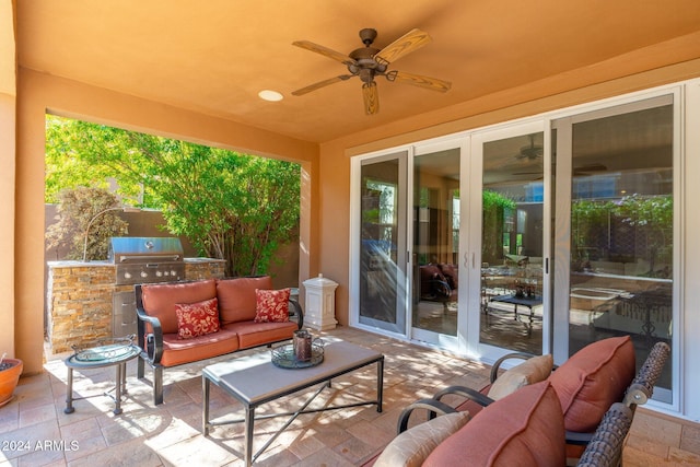 view of patio with outdoor lounge area, ceiling fan, area for grilling, and a grill