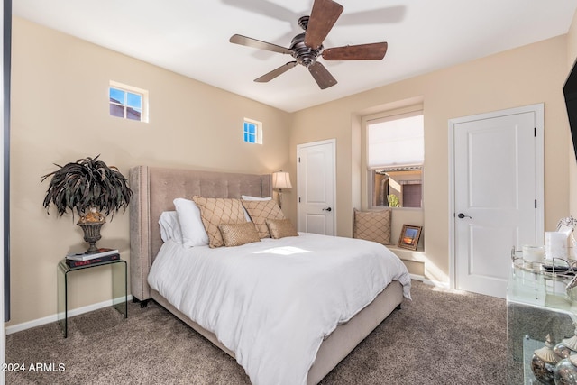 bedroom with ceiling fan and carpet floors