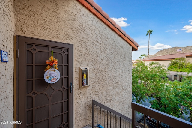 doorway to property with a balcony