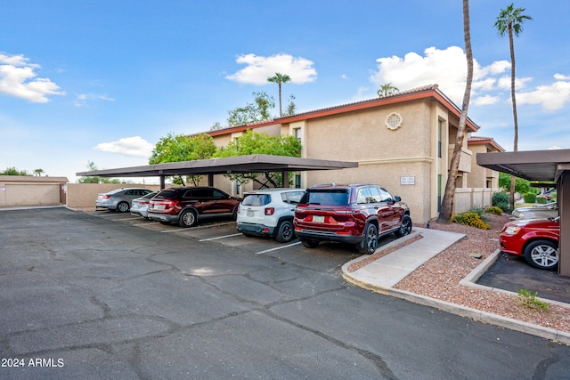 exterior space with a carport