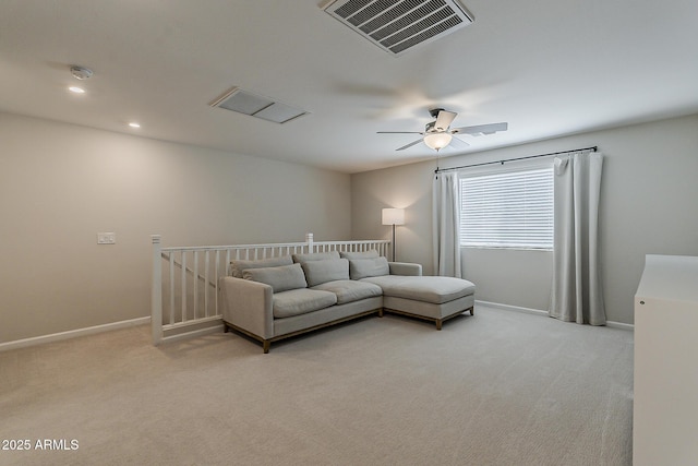 living room with recessed lighting, visible vents, light carpet, baseboards, and ceiling fan