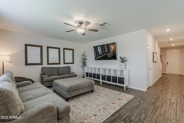 living area with recessed lighting, wood finished floors, visible vents, baseboards, and ceiling fan