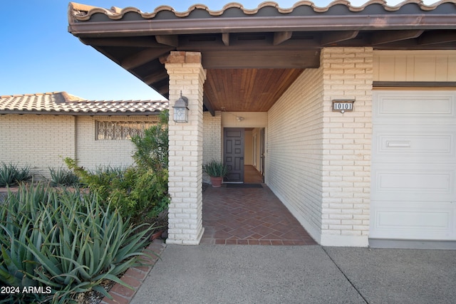 property entrance featuring a garage