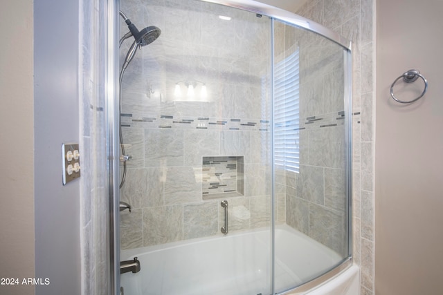 bathroom featuring enclosed tub / shower combo