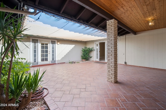 view of patio featuring french doors