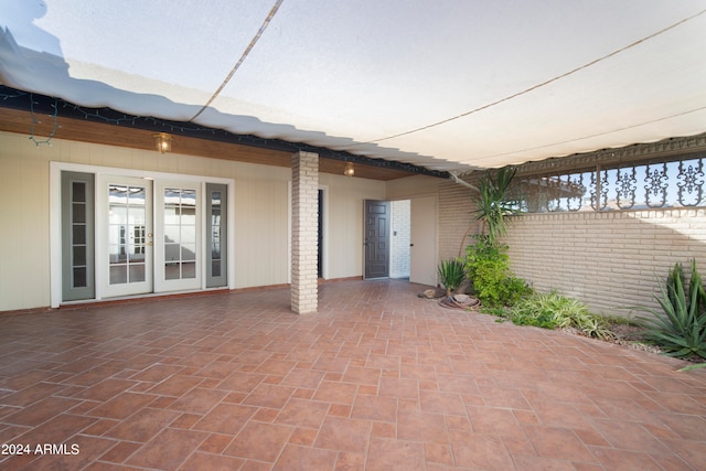 view of patio featuring french doors