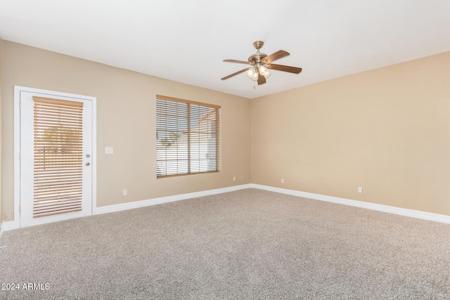 unfurnished room featuring carpet flooring and ceiling fan