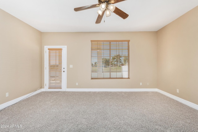 unfurnished room featuring carpet flooring and ceiling fan