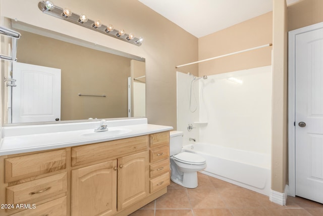 full bathroom with tile patterned floors, vanity,  shower combination, and toilet