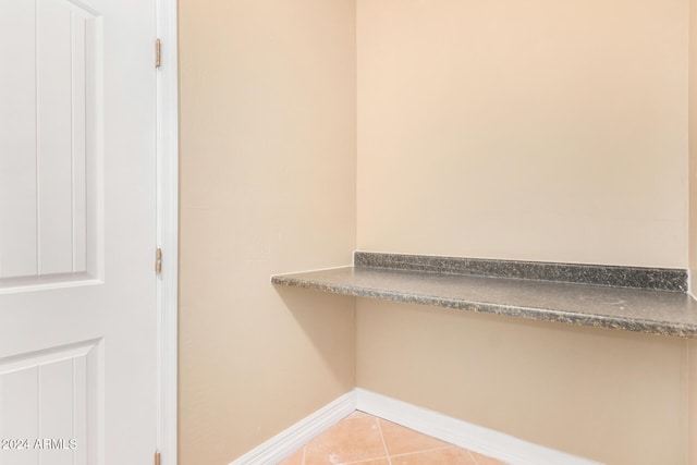 interior space with light tile patterned floors