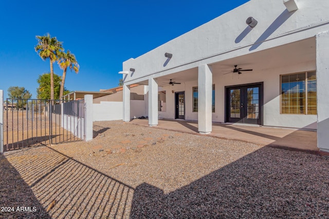 back of house with ceiling fan, a patio area, and french doors