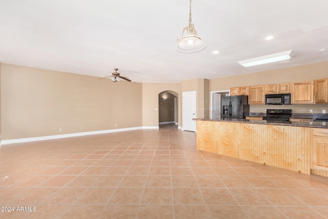 kitchen with ceiling fan, black appliances, light brown cabinets, hanging light fixtures, and light tile patterned flooring