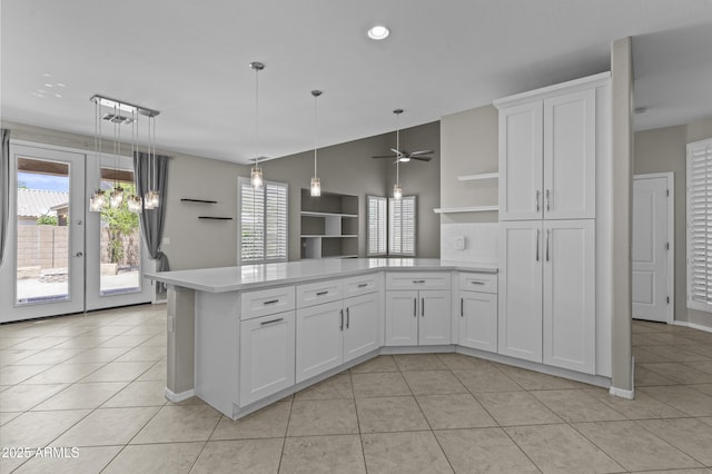 1162 E Ranch Ct, Gilbert, AZ 85296 - kitchen featuring open shelves, light tile patterned floors, light countertops, a peninsula, and vaulted ceiling