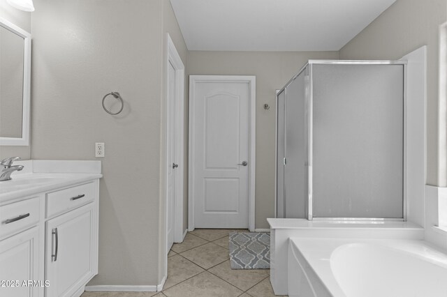 1162 E Ranch Ct, Gilbert, AZ 85296 - full bath with vanity, a shower stall, a bath, tile patterned floors, and baseboards