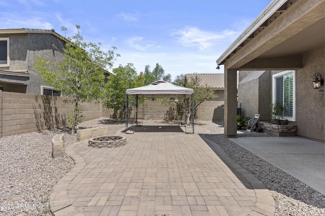 1162 E Ranch Ct, Gilbert, AZ 85296 - fenced backyard with a gazebo, an outdoor fire pit, and a patio