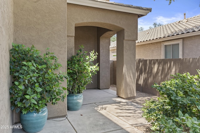 1162 E Ranch Ct, Gilbert, AZ 85296 - doorway to property with stucco siding and a tile roof