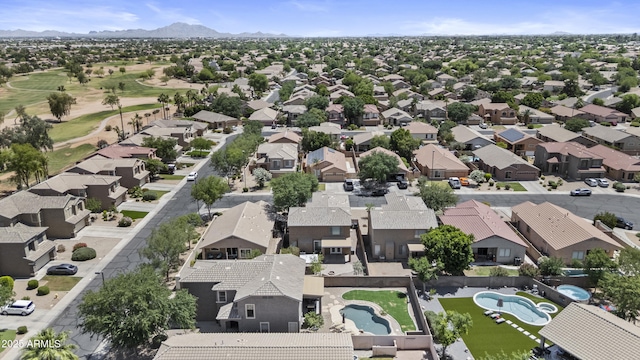 1162 E Ranch Ct, Gilbert, AZ 85296 - aerial view of residential area with a pool, a mountain backdrop, and a golf club