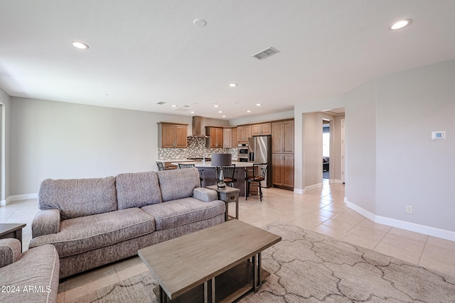 living room with light tile patterned floors