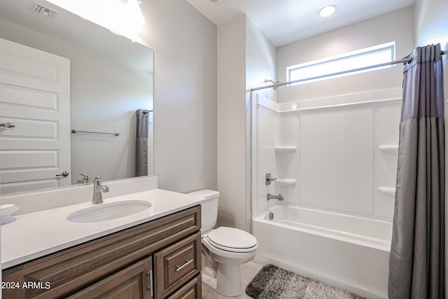 full bathroom featuring tile patterned flooring, toilet, shower / tub combo, and vanity