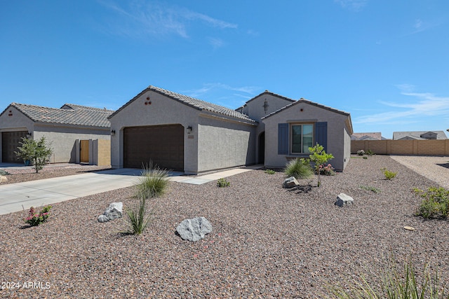 view of front of home with a garage