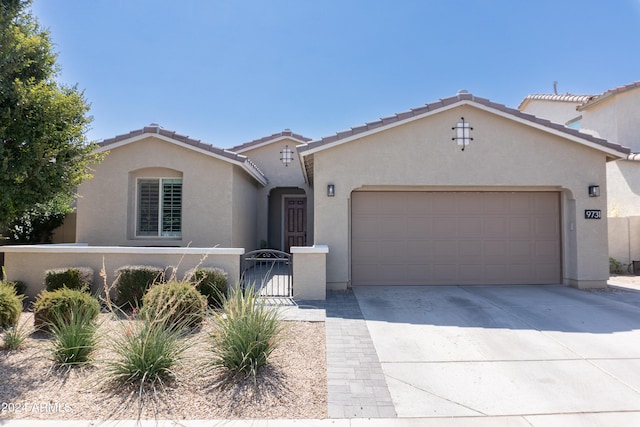 view of front of home with a garage