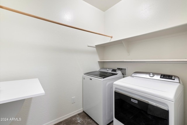 laundry area with separate washer and dryer