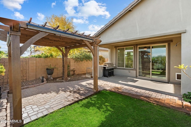 view of patio / terrace with a pergola and grilling area