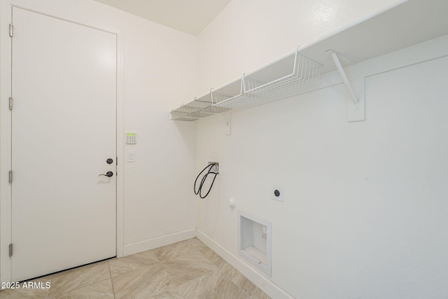 washroom featuring hookup for an electric dryer, baseboards, and hookup for a washing machine