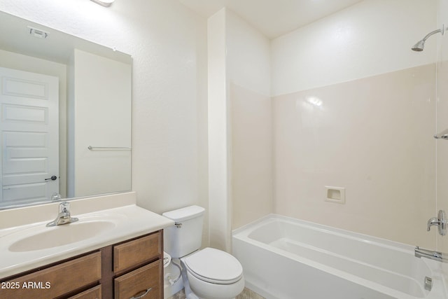 bathroom with shower / bathtub combination, toilet, and vanity